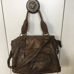 OiOi distressed leather diaper bag